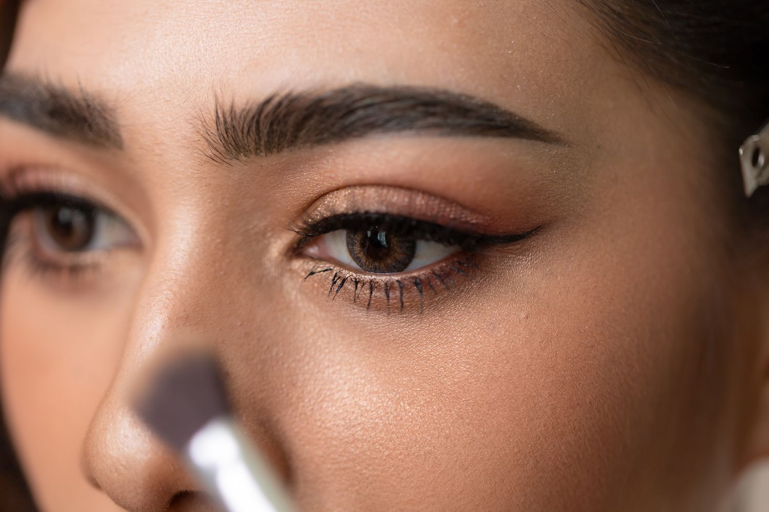 Apply mascara and thin eyeliner